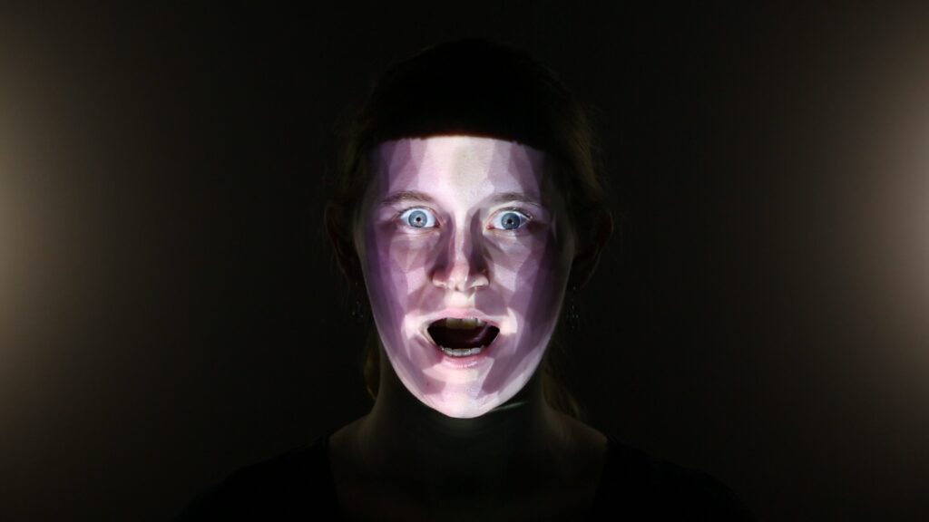 FaceForge: Markerless Non-Rigid Face Multi-Projection Mapping